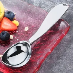 Kökssked i metall för att servera glass och sorbet
