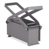 Robust brikettpress för grått papper