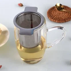 Te-kaffe-örtsil i rostfritt stål med lock
